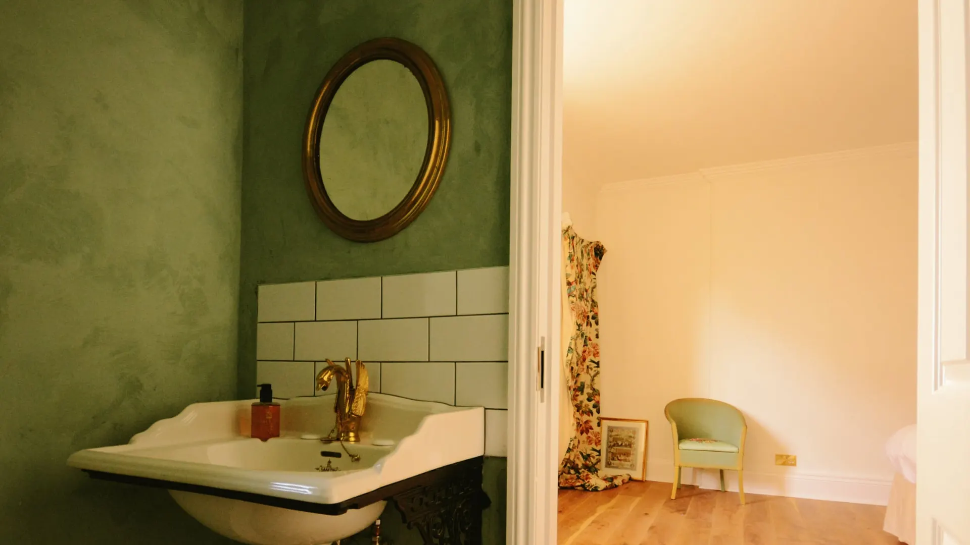 The green-panelled bathroom of the Family Room